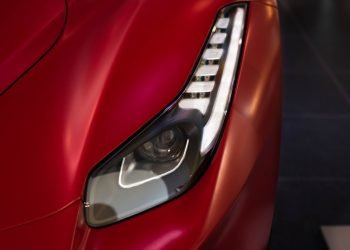 a close up of a red sports car
